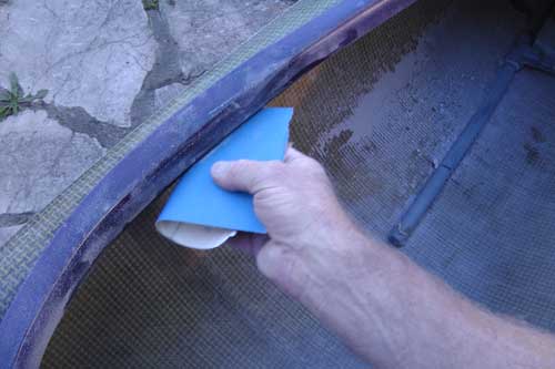 Sanding down the inside of the cockpit